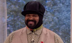 Why Does Gregory Porter Cover His Head?